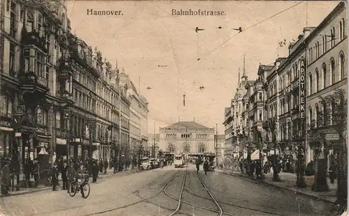 Ansichtskarte Hannover Bahnhofstrasse, Straßenbahn und Geschäfte 1915