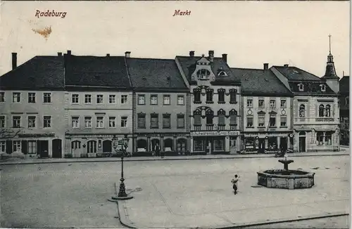 Ansichtskarte Radeburg Marktplatz - Geschäfte 1913