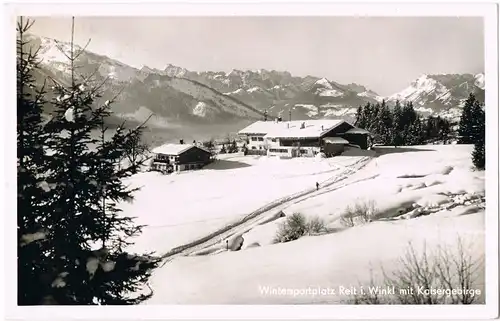 Ansichtskarte Reit im Winkl Häuser mmit Kaisergebirge im Winter 1954