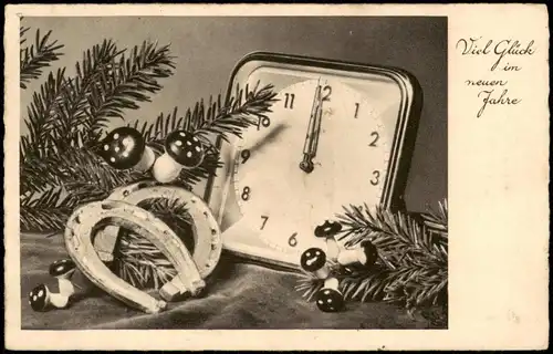 Glückwunsch Neujahr 12 Uhr neben Glückssymbol Hufeisen Fliegenpilz 1940