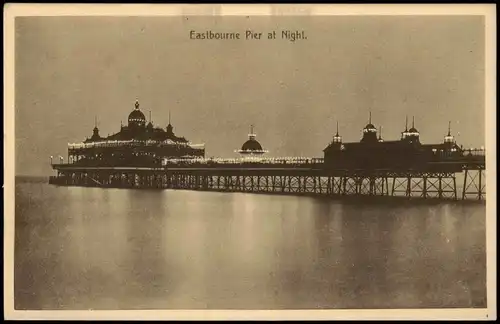 Postcard Eastbourne Pier at night 1925