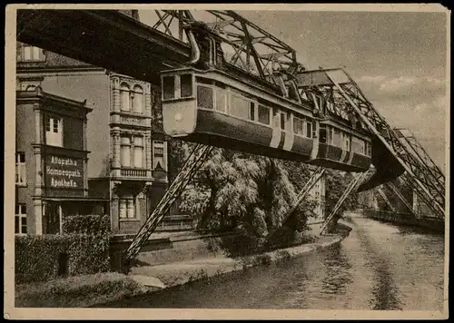 Ansichtskarte Wuppertal Schwebebahn an der Adlerbrücke, Apotheke 1950