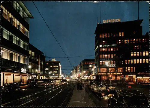 Düsseldorf Schadowstraße am Abend, Geschäfte Geschäftsstraße 1957