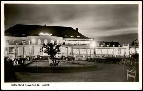Ansichtskarte Travemünde-Lübeck Casino, Leuchtreklame bei Nacht 1954