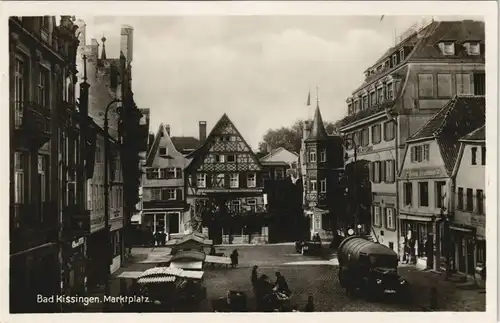 Ansichtskarte Bad Kissingen Marktplatz, LKW, Geschäfte - Hütten 1932