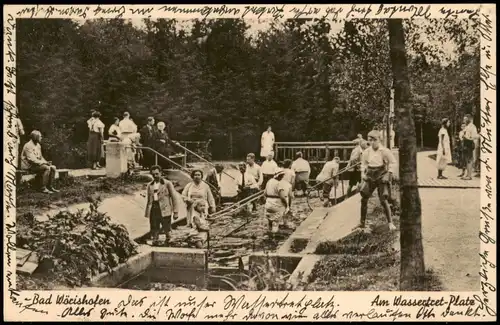 Ansichtskarte Bad Wörishofen Am Wasserplatz, Menschen bei der Kneipkur 1940