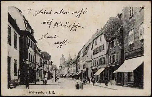 CPA Weißenburg Elsaß Wissembourg Straßenpartie, Geschäfte 1916 Feldpoststempel