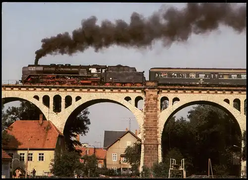 Eisenbahn & Lokomotiven: Dampflokomotive mit Schnellzug der DR 1980