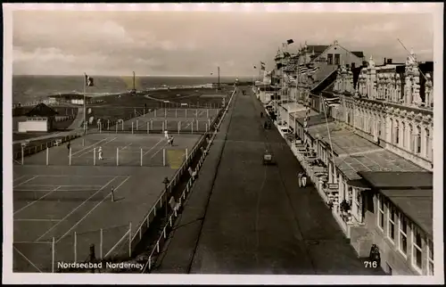 Ansichtskarte Norderney Promenade, Tennisplätze - Geschäfte 1938