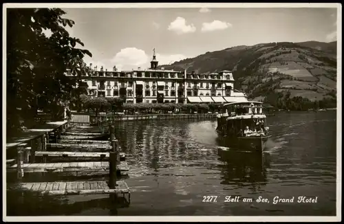 Ansichtskarte Zell am See Grand Hotel mit kleinem Fahrgastschiff 1930