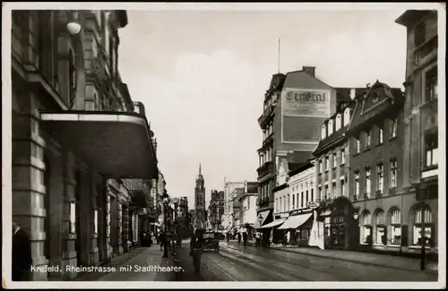 Ansichtskarte Krefeld Crefeld Rheinstraße, Geschäfte - Fotokarte 1934