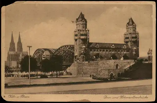 Ansichtskarte Köln Hohenzollernbrücke im Hintergrund der Dom 1920