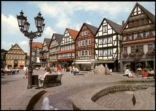 Ansichtskarte Rinteln Marktplatz Leute vor den diversen Geschäften 1980