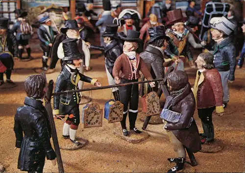 Uhrenhändler auf einem Jahrmarkt in St. Blasien Künstlerkarte Holzfiguren 1990