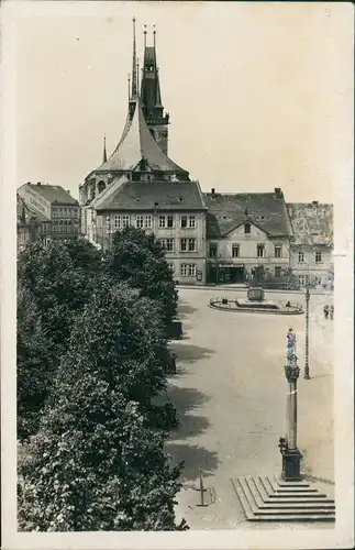 Postcard Laun Louny Marktplatz, Geschäfte 1934