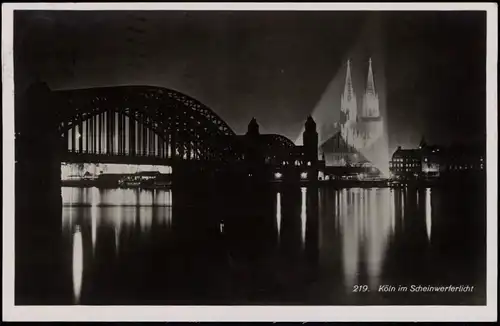 Ansichtskarte Köln Dom und Rhein Brücke im Scheinwerferlicht 1930