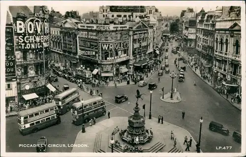 Postcard London Piccadilly Circus, Geschäfte Reger Verkehr 1957
