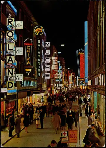 Köln Hohestraße, Geschäftsstrasse, Leuchtreklame Nacht Leute beim Shopping 1965