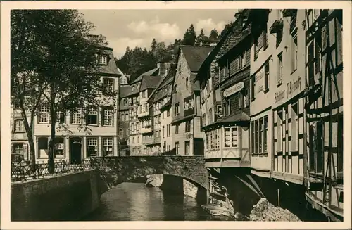 Ansichtskarte Monschau/Eifel Montjoie Geschäfte, Rurpartie 1940