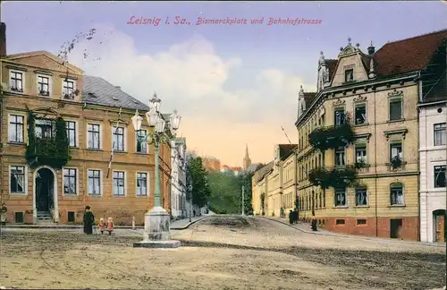 Ansichtskarte Leisnig Bismarckplatz und Bahnhofstrasse 1915  gel. Feldpost
