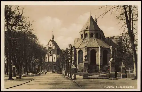 Ansichtskarte Norden Ludgerikirche, Straßenpartie 1941  gel. Feldpoststempel WK2