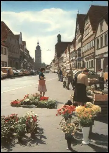 Ebern Ortsansicht, Autos, Leute beim Einkaufen am Blumenstand 1970