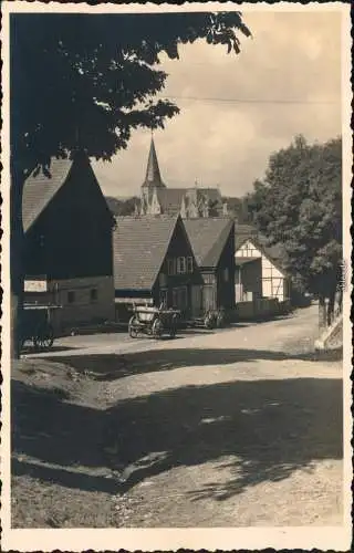 Ansichtskarte Goslar Weg mit Pferdekarren Häusern und Kirche 1936