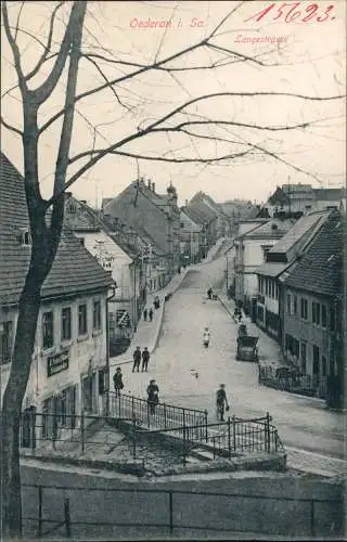 Ansichtskarte Oederan Langestraße, Personen vor Geschäft 191