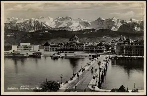 Ansichtskarte Luzern Lucerna Seebrücke, Bahnhof und Alpen 1934