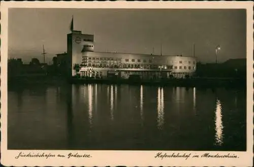 Ansichtskarte Friedrichshafen Hafenbahnhof im Mondenschein - Fotokarte 1938