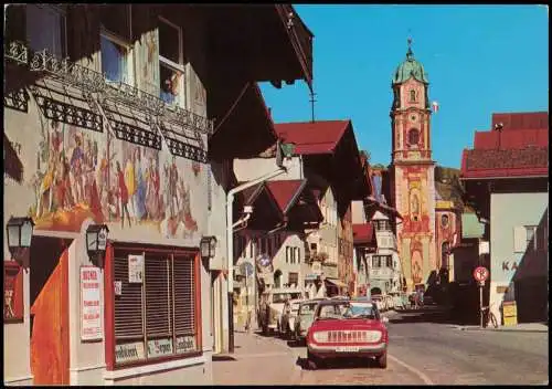 Mittenwald Ortsansicht, bemaltes Haus, Autos u.a. alter Ford 1973