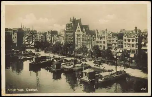 Postkaart Amsterdam Amsterdam Damrak. Bootsanleger 1932