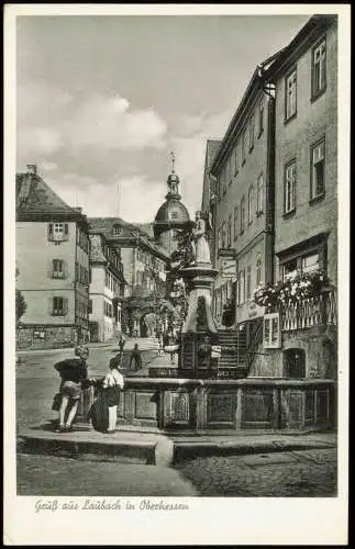 Ansichtskarte Laubach (Hessen) Jungen am Brunnen Geschäfte 1963