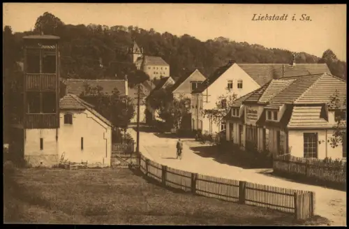 Ansichtskarte Liebstadt Hauptstraße mit Fahrradfahrer und Burg 1914