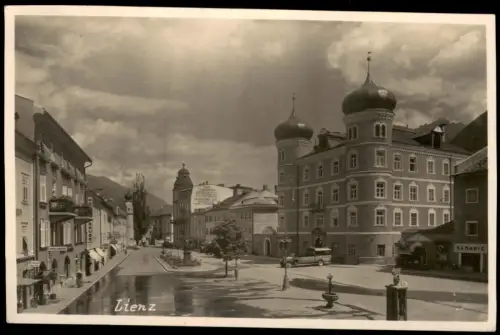 Ansichtskarte Lienz Straßenszene Bus Geschäfte 1929