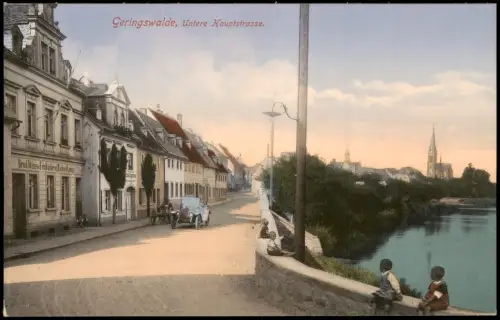 Ansichtskarte Geringswalde Untere Hauptstrasse. Auto Geschäfte 1913