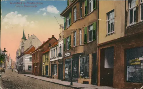 Ansichtskarte Wiesdorf-Leverkusen Untere Hauptstraße, Geschäfte 1917