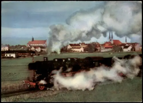 Ansichtskarte Altötting Qaulmende Dampflokomotive passiert den Ort 1960