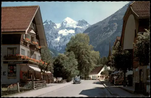 Ansichtskarte Kandersteg Bahnhofstrasse mit Blümlisalp 1960