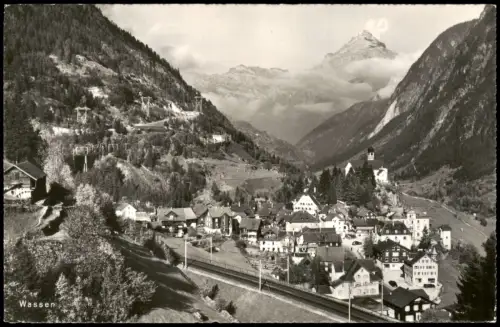 Ansichtskarte Wassen Ortsansicht mit Pfarrkirche und Gotthardbahn-Trasse 1955