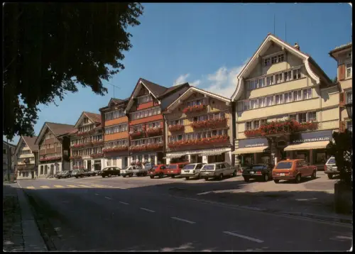 Ansichtskarte Urnäsch Dorfplatz Blumenschmuck Autos u.a. VW Golf 1980