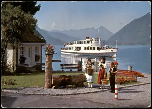 Iseltwald Iseltwald am Brienzersee mit Berner Trachten und MS Interlaken 1967