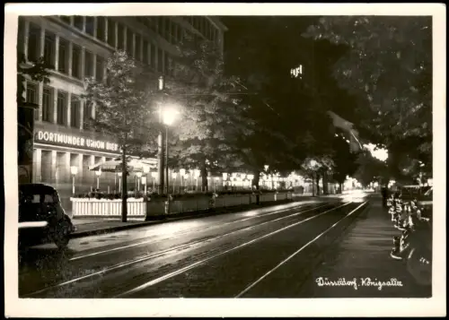 Düsseldorf Königsallee bei Nacht mit Dortmunder Union Bier Leuchtreklame 1955