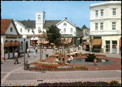 Ansichtskarte Norderney Brunnen am Kurplatz mit Blick zur Poststraße 1986