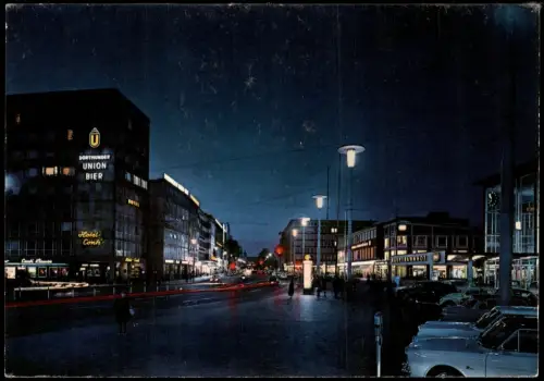 Münster (Westfalen) Hauptbahnhof Vorplatz bei Nacht, Autos, Leuchtreklame 1960