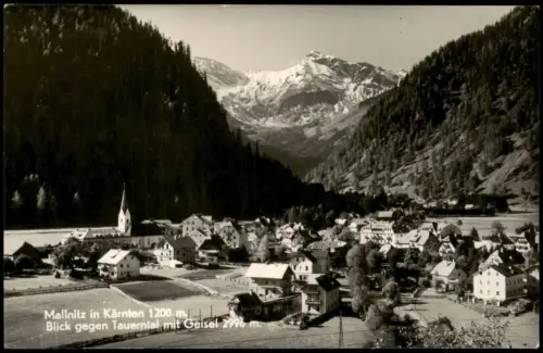 Mallnitz Ortsansicht mit Kirche und Blick auf das Tauerntal mit Berggipfel 1958